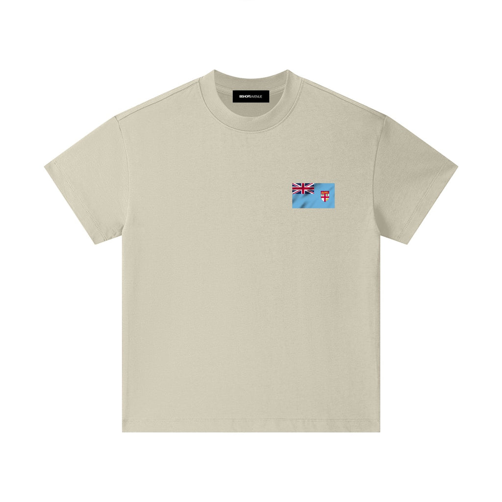 BIshops Avenue neutral beige 100% cotton t-shirt with Fiji flag graphic on left chest.